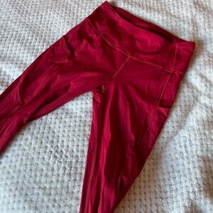 Fast and free 25” inseam red women’s leggings size 8.